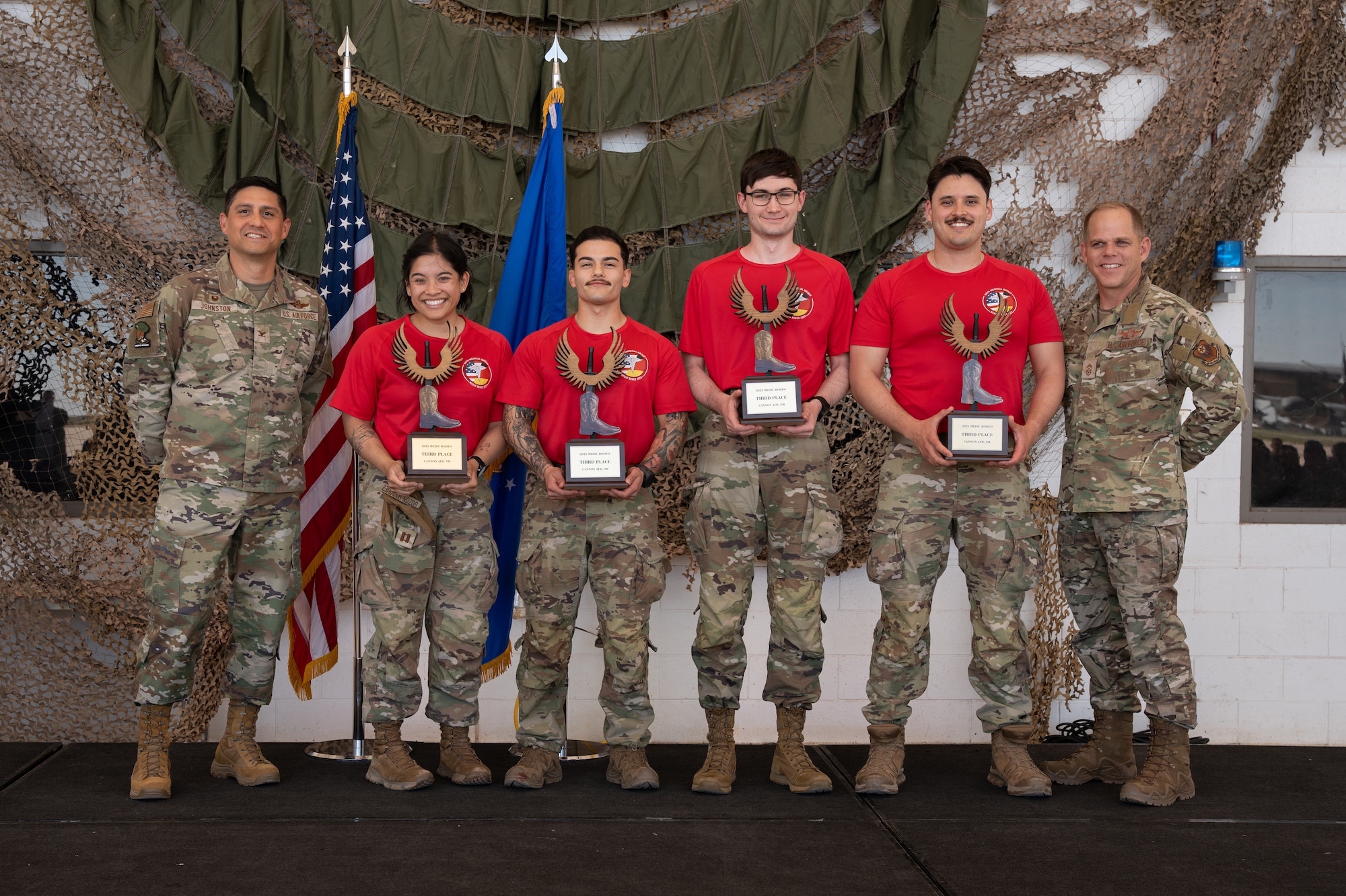 U.S. Air Force Airmen from Landstuhl Regional Medical Center, Landstuhl, Germany, pose with 27th Special Operations Wing leadership at Cannon Air Force Base, New Mexico.
