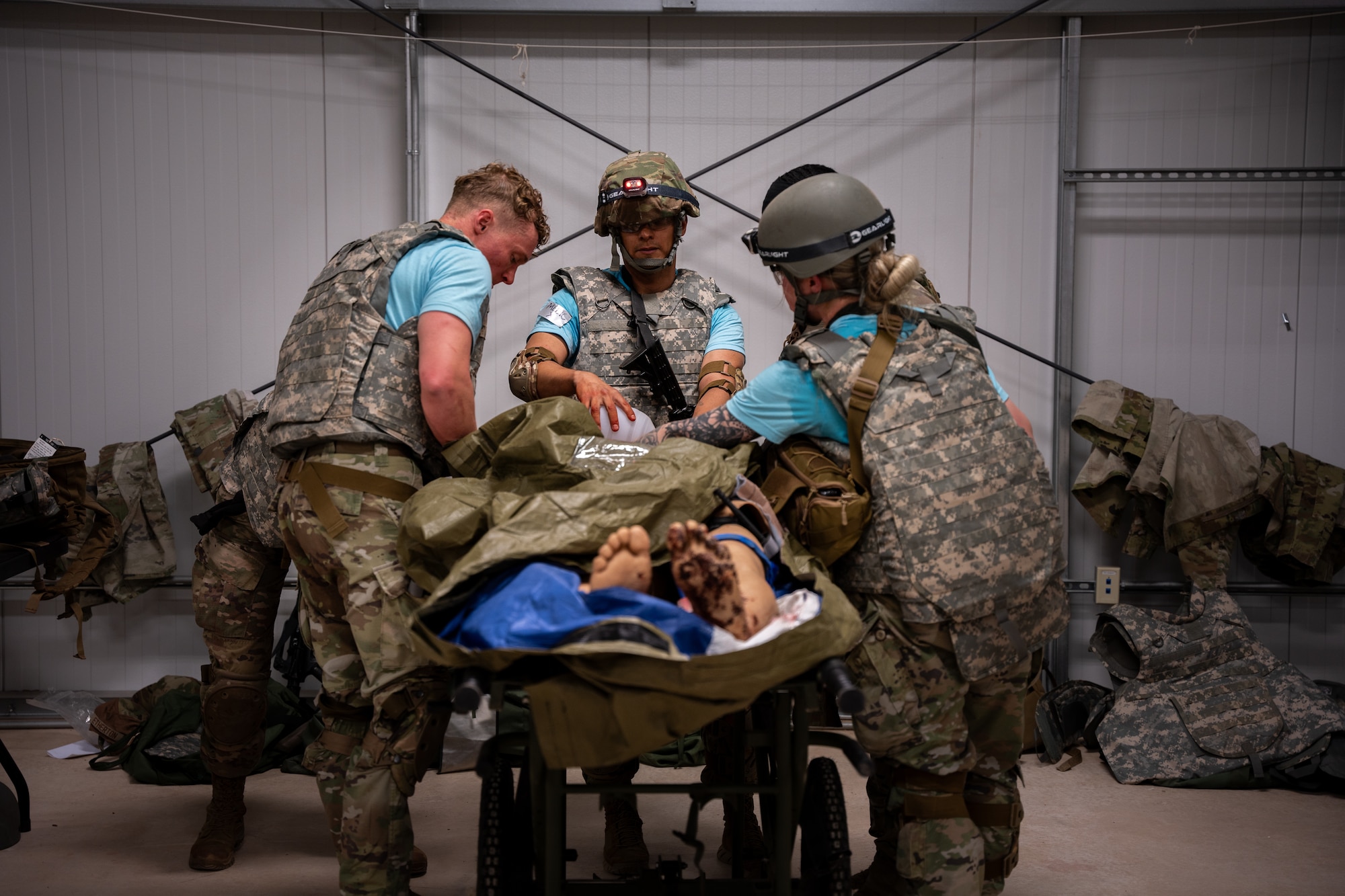 U.S. Air Force medics treat a simulated patient during the 16th Annual Medic Rodeo exercise at Melrose Air Force Range, New Mexico.