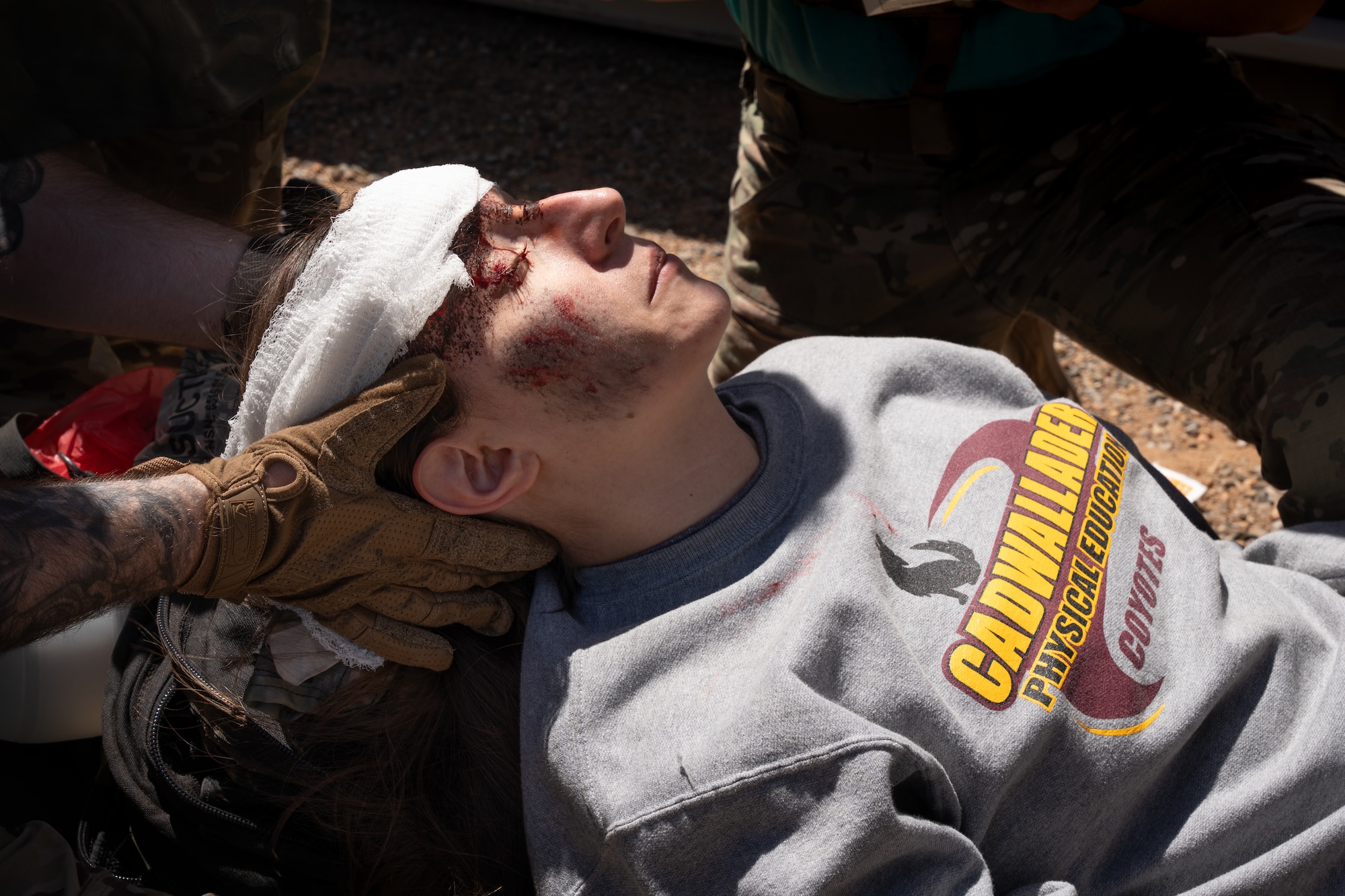 A simulated casualty receives care during a mass casualty exercise at Cannon Air Force Base, New Mexico.