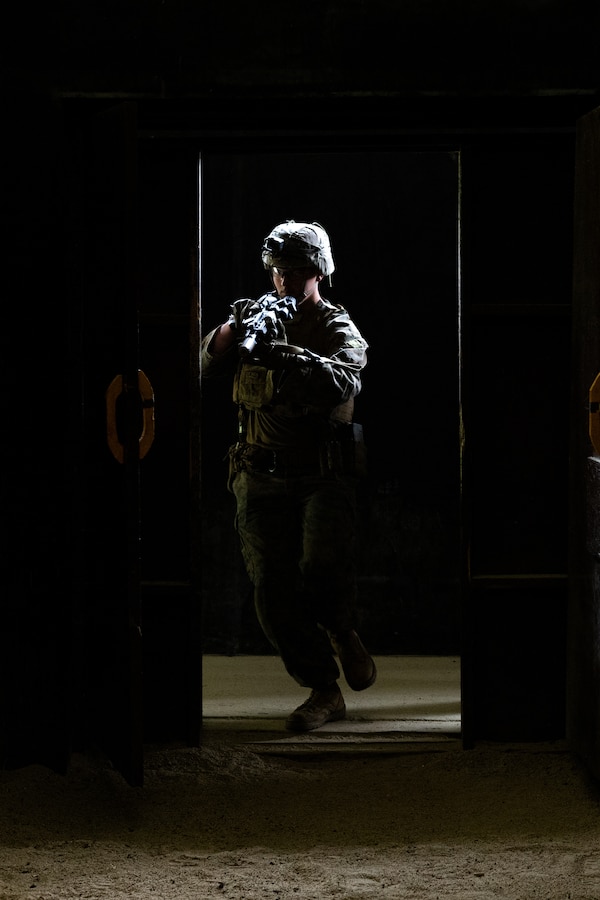 A U.S. Marine with 2nd Battalion, 23rd Marines, forward deployed with 4th Marine Regiment, 3d Marine Division as part of the Unit Deployment Program, conducts room clearings during a live fire shoothouse as a part of military operations in urban terrain training during Korea Viper 25.4 at Camp Rodriguez, South Korea, May 24, 2025. Korea Viper is a recurring exercise series that demonstrates the Republic of Korea and U.S. Marine Corps' ability to respond decisively in the region as a singular, unified force while strengthening relationships and trust between the two allies. (U.S. Marine Corps photo by Lance Cpl. Tucker Mocan)