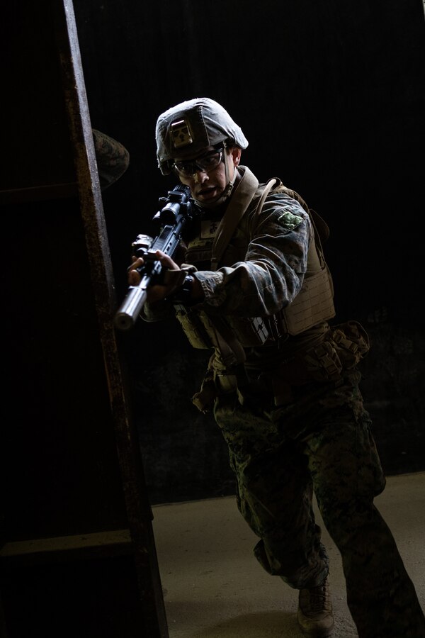 A U.S. Marine with 2nd Battalion, 23rd Marines, forward deployed with 4th Marine Regiment, 3d Marine Division as part of the Unit Deployment Program, conducts room clearings during a live fire shoothouse as a part of military operations in urban terrain training during Korea Viper 25.4 at Camp Rodriguez, South Korea, May 24, 2025. Korea Viper is a recurring exercise series that demonstrates the Republic of Korea and U.S. Marine Corps' ability to respond decisively in the region as a singular, unified force while strengthening relationships and trust between the two allies. (U.S. Marine Corps photo by Lance Cpl. Tucker Mocan)
