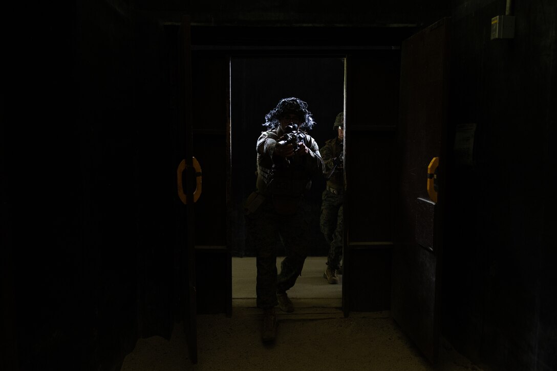 A U.S. Marine with 2nd Battalion, 23rd Marines, forward deployed with 4th Marine Regiment, 3d Marine Division as part of the Unit Deployment Program, conducts room clearings during a live fire shoothouse as a part of military operations in urban terrain training during Korea Viper 25.4 at Camp Rodriguez, South Korea, May 24, 2025. Korea Viper is a recurring exercise series that demonstrates the Republic of Korea and U.S. Marine Corps' ability to respond decisively in the region as a singular, unified force while strengthening relationships and trust between the two allies. (U.S. Marine Corps photo by Lance Cpl. Tucker Mocan)