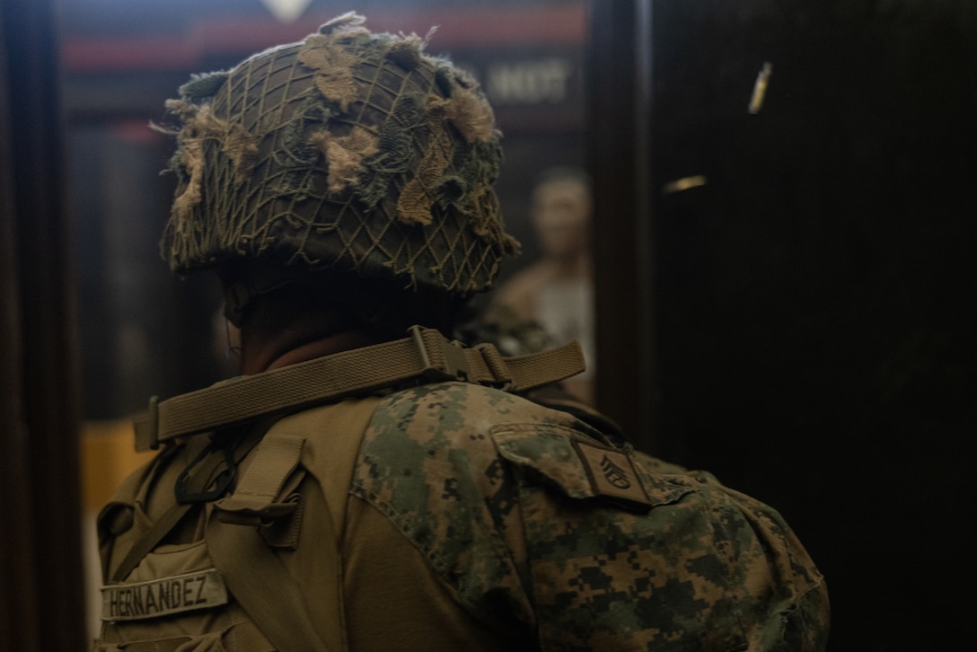 U.S. Marine Corps Staff Sgt. Jesse Hernandez, a machine gunner with 2nd Battalion, 23rd Marines forward deployed with 4th Marine Regiment, 3d Marine Division as part of the Unit Deployment Program, engages targets during a during a live fire shoothouse as a part of military operations in urban terrain training during Korea Viper 25.4 at Camp Rodriguez, South Korea, May 24, 2025. Korea Viper is a recurring exercise series that demonstrates the Republic of Korea and U.S. Marine Corps' ability to respond decisively in the region as a singular, unified force while strengthening relationships and trust between the two allies. Hernandez is a native of California. (U.S. Marine Corps photo by Lance Cpl. Tucker Mocan)