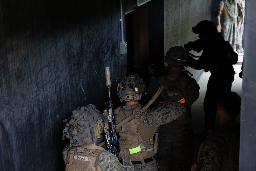 U.S. Marines with 2nd Battalion, 23rd Marines, forward deployed with 4th Marine Regiment, 3d Marine Division as part of the Unit Deployment Program, clear buildings during a live fire shoothouse as a part of military operations in urban terrain training during Korea Viper 25.4 at Camp Rodriguez, South Korea, May 24, 2025. Korea Viper is a recurring exercise series that demonstrates the Republic of Korea and U.S. Marine Corps' ability to respond decisively in the region as a singular, unified force while strengthening relationships and trust between the two allies. (U.S. Marine Corps photo by Lance Cpl. Tucker Mocan)