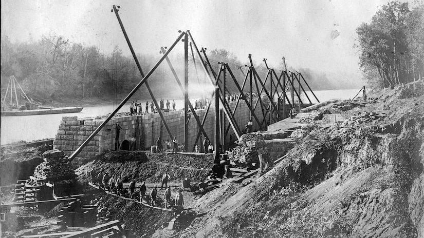 A Derrick arrangement is in the pit during the construction of Lock 4 Oct. 26, 1894, on the Cumberland River in Tennessee.  The lock and dam were constructed to establish a navigation channel. The lock and dam were replaced by today's modern system of dams. (USACE Photo)