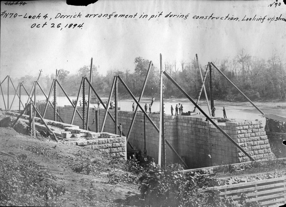A Derrick arrangement is in the pit during the construction of Lock 4 Oct. 26, 1894 on the Cumberland River in Tennessee.  The lock and dam were constructed to establish a navigation channel. The lock and dam were replaced by today's modern system of dams. (USACE Photo)