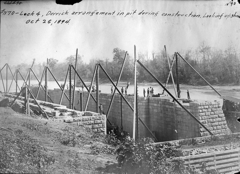 A Derrick arrangement is in the pit during the construction of Lock 4 Oct. 26, 1894 on the Cumberland River in Tennessee.  The lock and dam were constructed to establish a navigation channel. The lock and dam were replaced by today's modern system of dams. (USACE Photo)