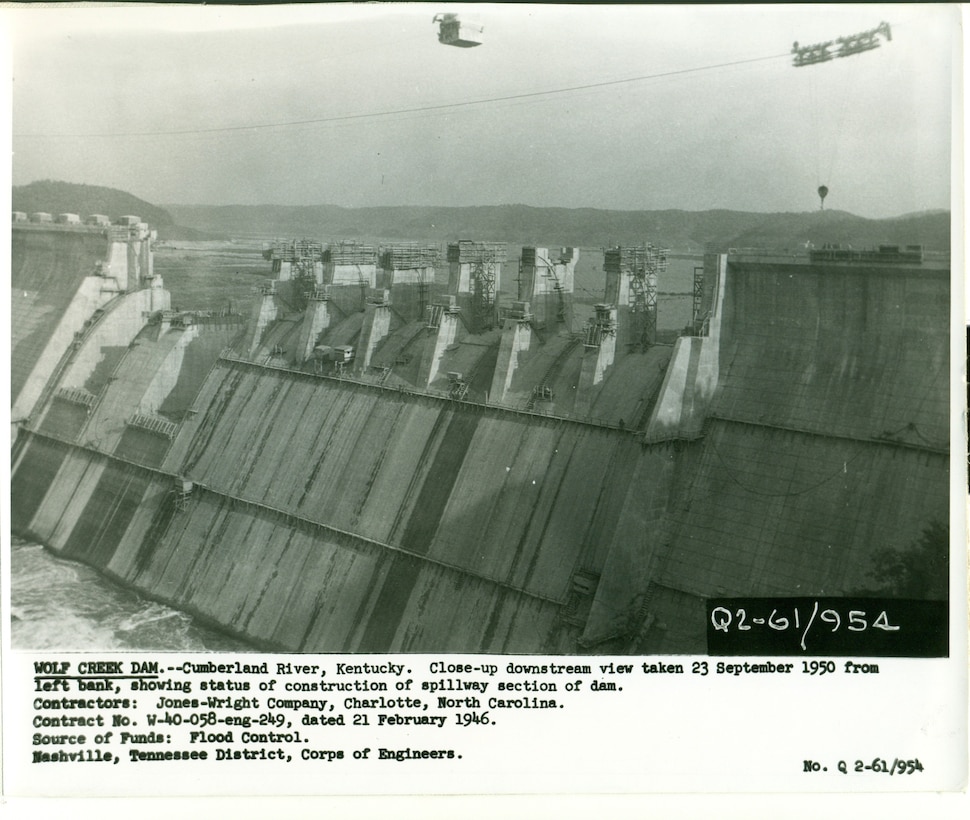 This is Wolf Creek Dam under construction Sept. 23, 1950, on the Cumberland River in Jamestown, Kentucky. The multi-purpose dam would serve to replace the old locks and dams on the Cumberland River. (USACE Photo)