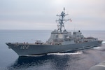The Arleigh Burke-class guided-missile destroyer USS Sampson (DDG 102) steams alongside the aircraft carrier USS Nimitz (CVN 68) in the Pacific Ocean, Oct. 5, 2024. Nimitz is underway in 3rd Fleet conducting routine training operations. (U.S. Navy photo by Mass Communication Specialist Seaman Joseph M. Paolucci)