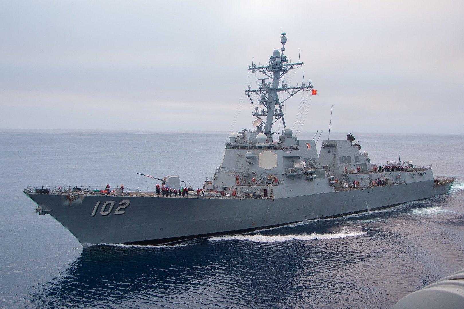 The Arleigh Burke-class guided-missile destroyer USS Sampson (DDG 102) steams alongside the aircraft carrier USS Nimitz (CVN 68) in the Pacific Ocean, Oct. 5, 2024. Nimitz is underway in 3rd Fleet conducting routine training operations. (U.S. Navy photo by Mass Communication Specialist Seaman Joseph M. Paolucci)