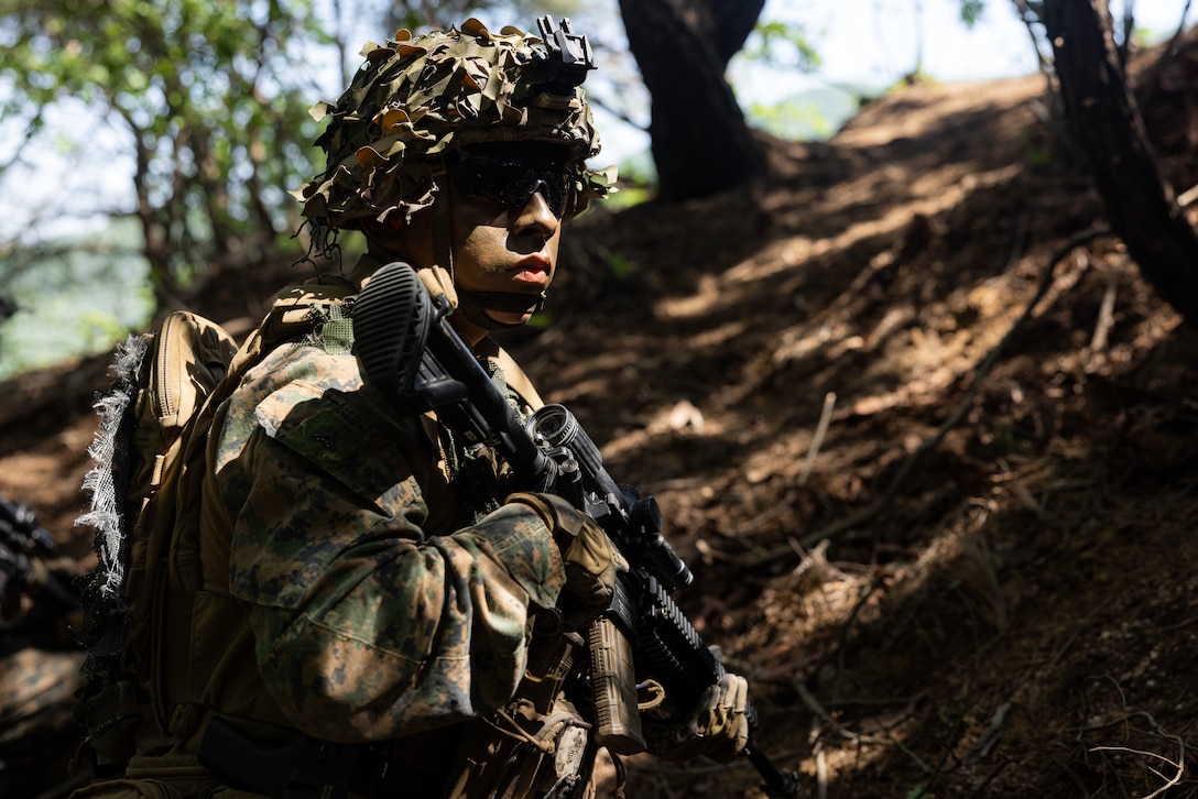 U.S. Marine Corps Lance Cpl. Salivin Kirk, an infantry rifleman with 2nd Battalion, 23rd Marines forward deployed with 4th Marine Regiment, 3d Marine Division as part of the Unit Deployment Program, posts security on a patrol during Korea Viper 25.4 at Camp Rodriguez, South Korea, May 22, 2025. Korea Viper is a recurring exercise series that demonstrates the Republic of Korea and U.S. Marine Corps' ability to respond decisively in the region as a singular, unified force while strengthening relationships and trust between the two allies. Kirk is a native of California. (U.S. Marine Corps photo by Lance Cpl. Tucker Mocan)