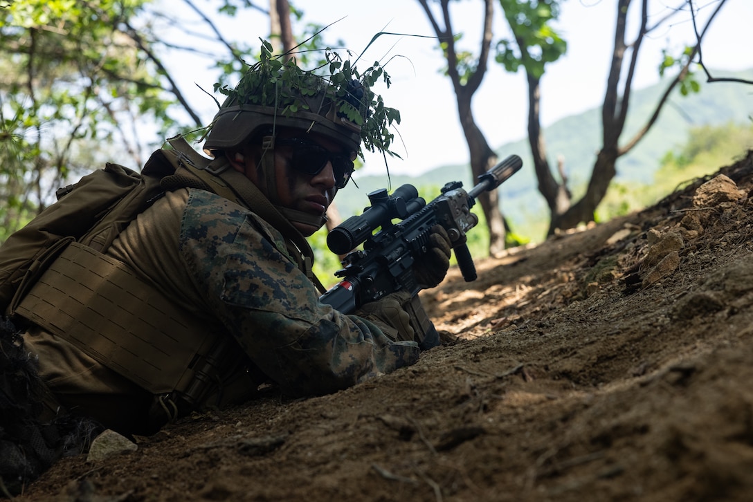 U.S. Marine Corps Cpl. Colton Metzger, an infantry rifleman with 2nd Battalion, 23rd Marines forward deployed with 4th Marine Regiment, 3d Marine Division as part of the Unit Deployment Program, posts security on a patrol during Korea Viper 25.4 at Camp Rodriguez, South Korea, May 22, 2025. Korea Viper is a recurring exercise series that demonstrates the Republic of Korea and U.S. Marine Corps' ability to respond decisively in the region as a singular, unified force while strengthening relationships and trust between the two allies. Metzger is a native of California. (U.S. Marine Corps photo by Lance Cpl. Tucker Mocan)