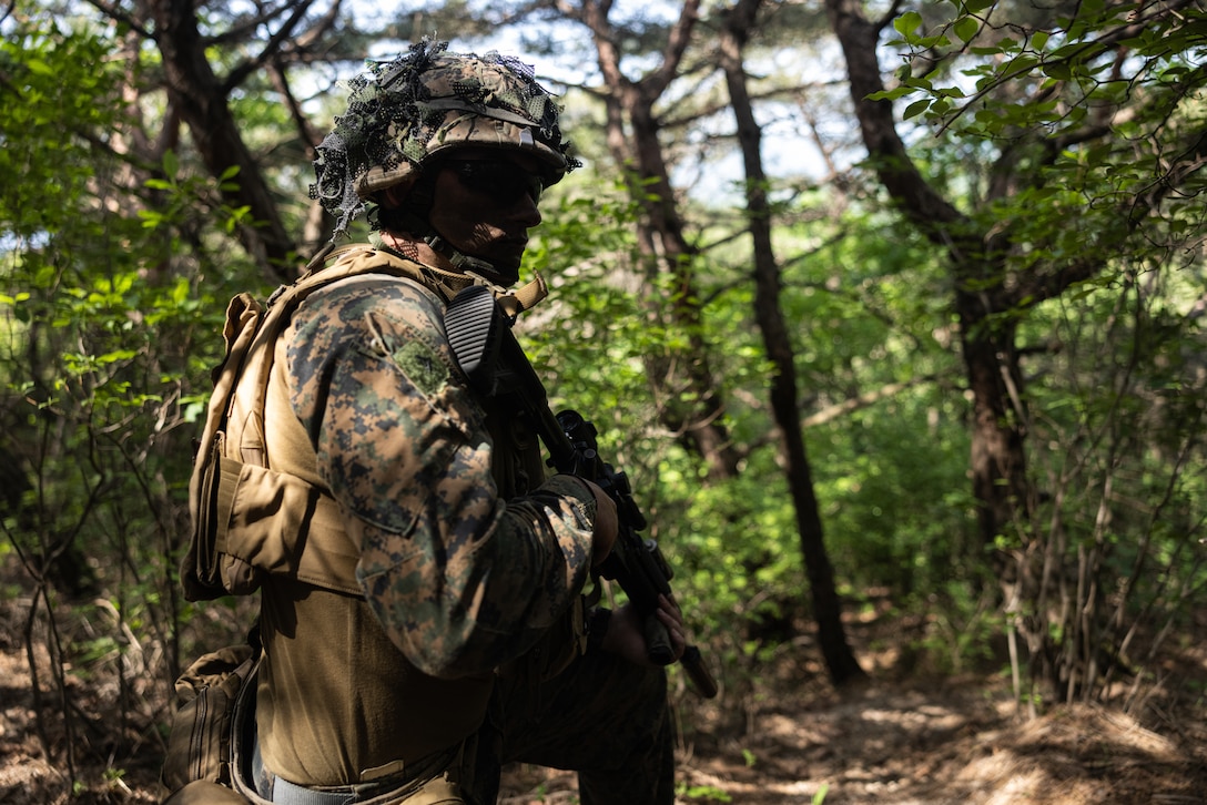 U.S. Marine Corps Lance Cpl. Nathan Bahlke, an infantry rifleman with 2nd Battalion, 23rd Marines forward deployed with 4th Marine Regiment, 3d Marine Division as part of the Unit Deployment Program, posts security on a patrol during Korea Viper 25.4 at Camp Rodriguez, South Korea, May 22, 2025. Korea Viper is a recurring exercise series that demonstrates the Republic of Korea and U.S. Marine Corps' ability to respond decisively in the region as a singular, unified force while strengthening relationships and trust between the two allies. Bahlke is a native of California. (U.S. Marine Corps photo by Lance Cpl. Tucker Mocan)