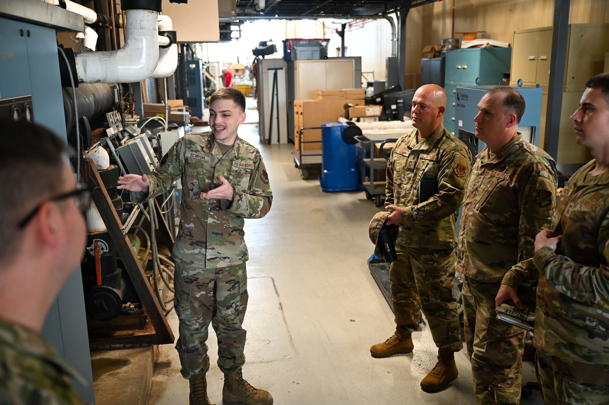 U.S. Air Force Staff Sgt. Kane Schrom, 16th Electronic Warfare Squadron B-52 equipment specialist, explains the 400 hertz converter capabilities and maintenance requirements to visiting A2 maintenance functional managers during a wing immersion tour at Eglin Air Force Base, Fla., May 28, 2025. The immersion lasted two days and allowed the visiting functional managers to engage with all A2s across the 350th Spectrum Warfare Wing to learn more about their unique electromagnetic warfare specific duties. (Courtesy Photo)