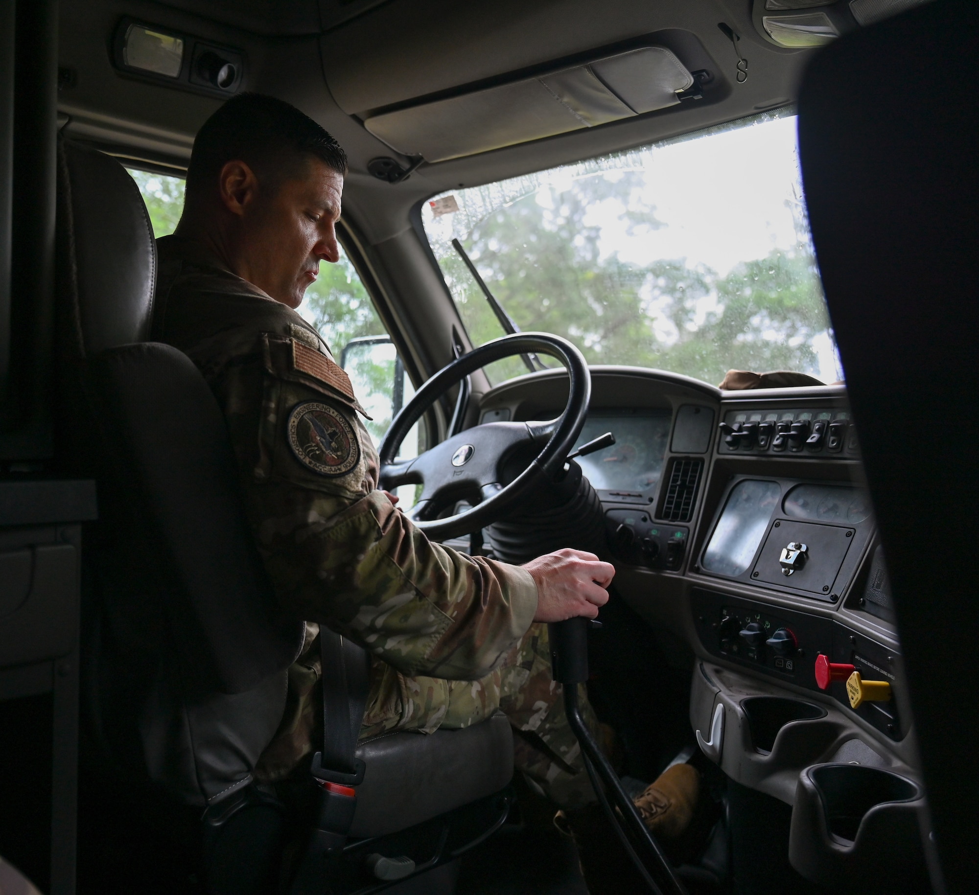 U.S. Air Force Chief Master Sgt. C. Ryan Shettler, Air Combat Command major command 2A3 functional manager, test drives the 87th Electronic Warfare Squadron’s semi truck during a wing immersion tour at Eglin Air Force Base, Fla., May 28, 2025. The immersion lasted two days and allowed the visiting functional managers to engage with all A2s across the 350th Spectrum Warfare Wing to learn more about their unique electromagnetic warfare specific duties. (Courtesy Photo)