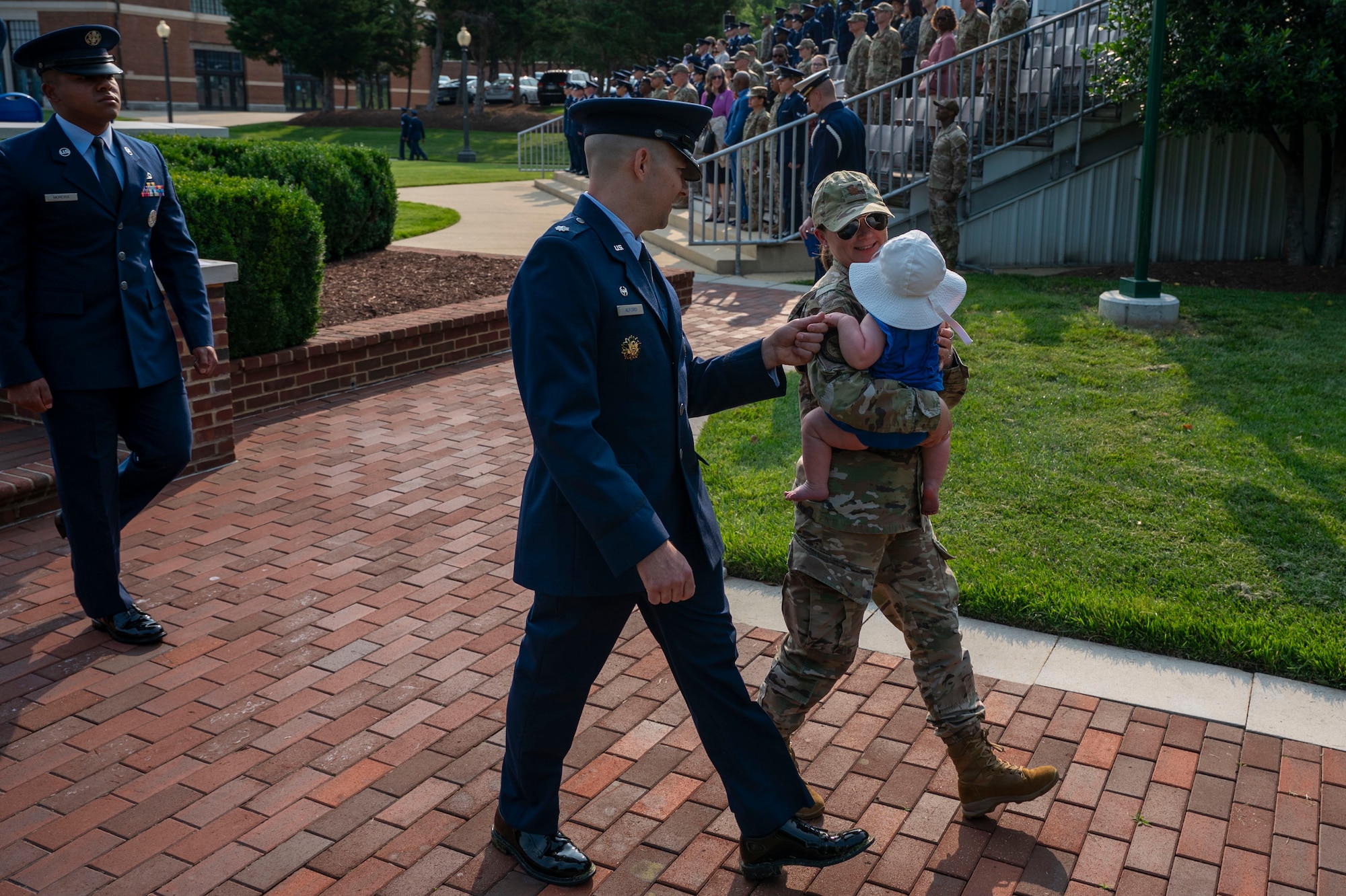 Air and Space Force personnel perform ceremonial assumption of command in dress uniform.
