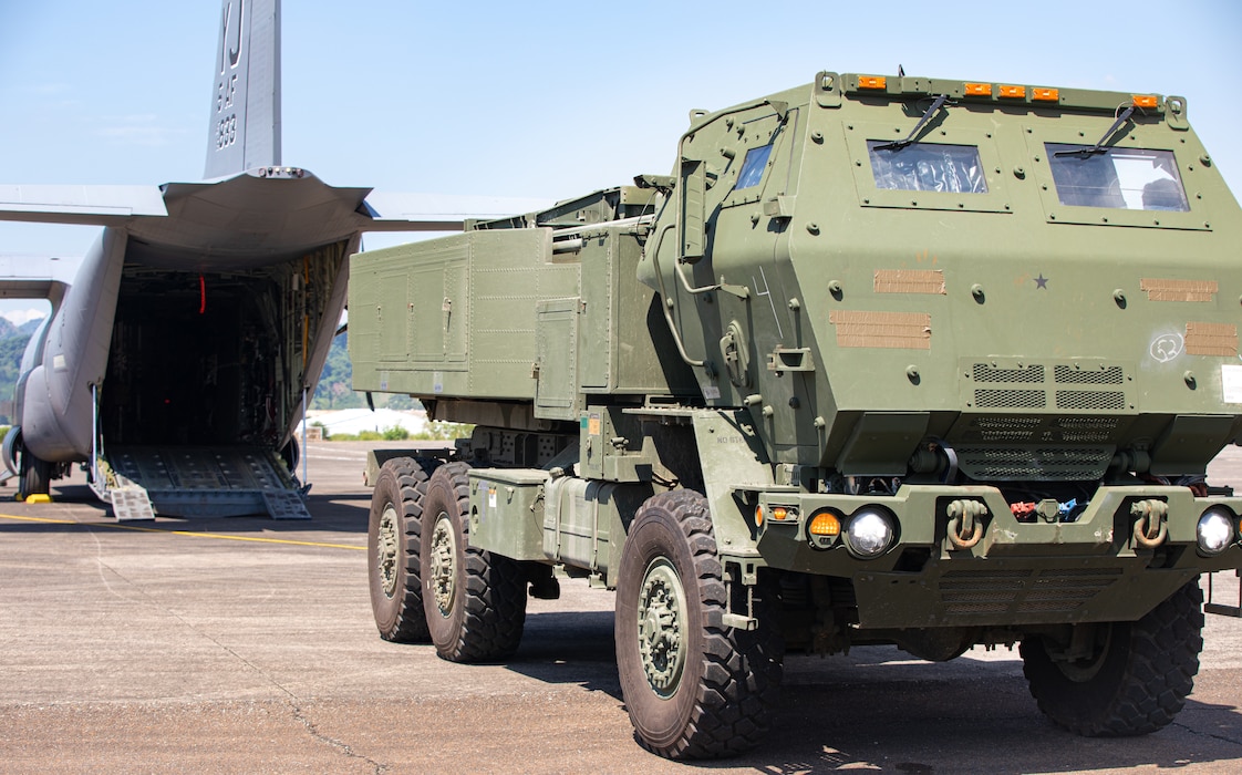 A High Mobility Artillery Rocket System (HIMARS), assigned to 1st Multi-Domain Task Force, U.S. Army Pacific (USARPAC), assumes the position for a line haul into a C-130 Hercules assigned to 374th Airlift Wing, 5th Air Force during a HIMARS Rapid Infiltration (HIRAIN), training event in support of Salaknib 25 at Subic Bay, Philippines, May 22, 2025.