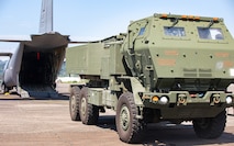 A High Mobility Artillery Rocket System (HIMARS), assigned to 1st Multi-Domain Task Force, U.S. Army Pacific (USARPAC), assumes the position for a line haul into a C-130 Hercules assigned to 374th Airlift Wing, 5th Air Force during a HIMARS Rapid Infiltration (HIRAIN), training event in support of Salaknib 25 at Subic Bay, Philippines, May 22, 2025.