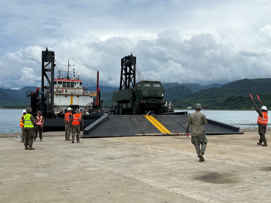 Soldiers from 5-3 Long Range Fires Battalion unload an M142 HIMARS from a Philippine Naval vessel during sea to shore landing training as part of Exercise Salaknib 2025 on May 31.