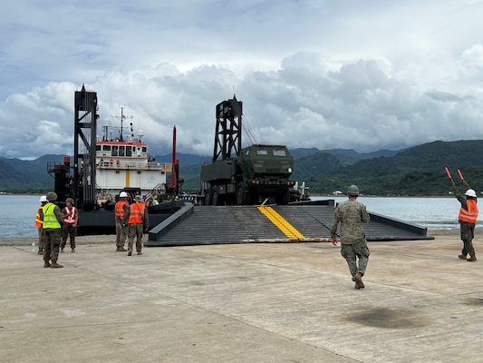 Soldiers from 5-3 Long Range Fires Battalion unload an M142 HIMARS from a Philippine Naval vessel during sea to shore landing training as part of Exercise Salaknib 2025 on May 31.
