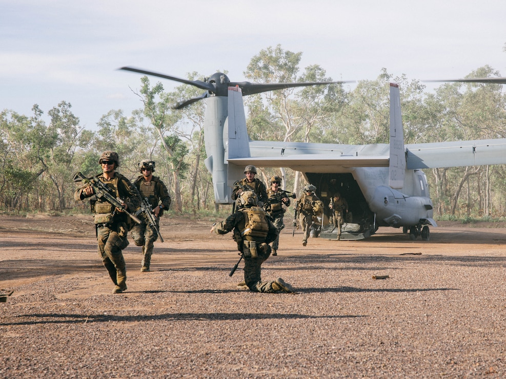 U.S. Marines with 2nd Battalion, 1st Marine Regiment, Marine Rotational Force – Darwin 25.3, disembark off an MV-22B Osprey assigned to Marine Medium Tiltrotor Squadron 363 (VMM-363), MRF-D 25.3, during an air assault rehearsal as part of Predator’s Walk at Mount Bundey Training Area, Northern Territory, Australia, May 28, 2025.