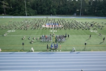 Airmen perform memorial pushups