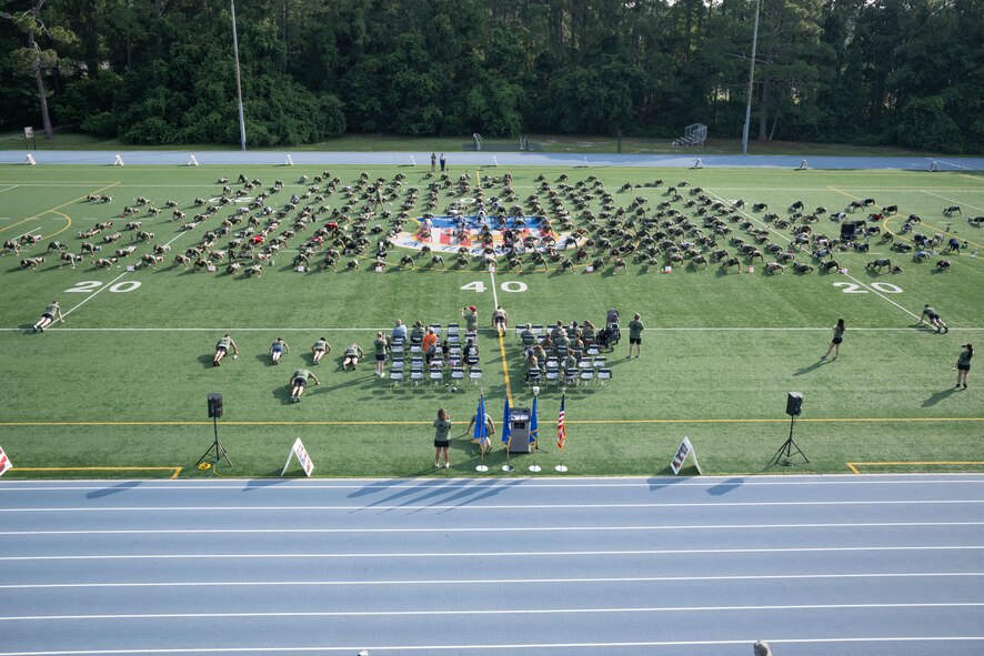 Airmen perform memorial pushups