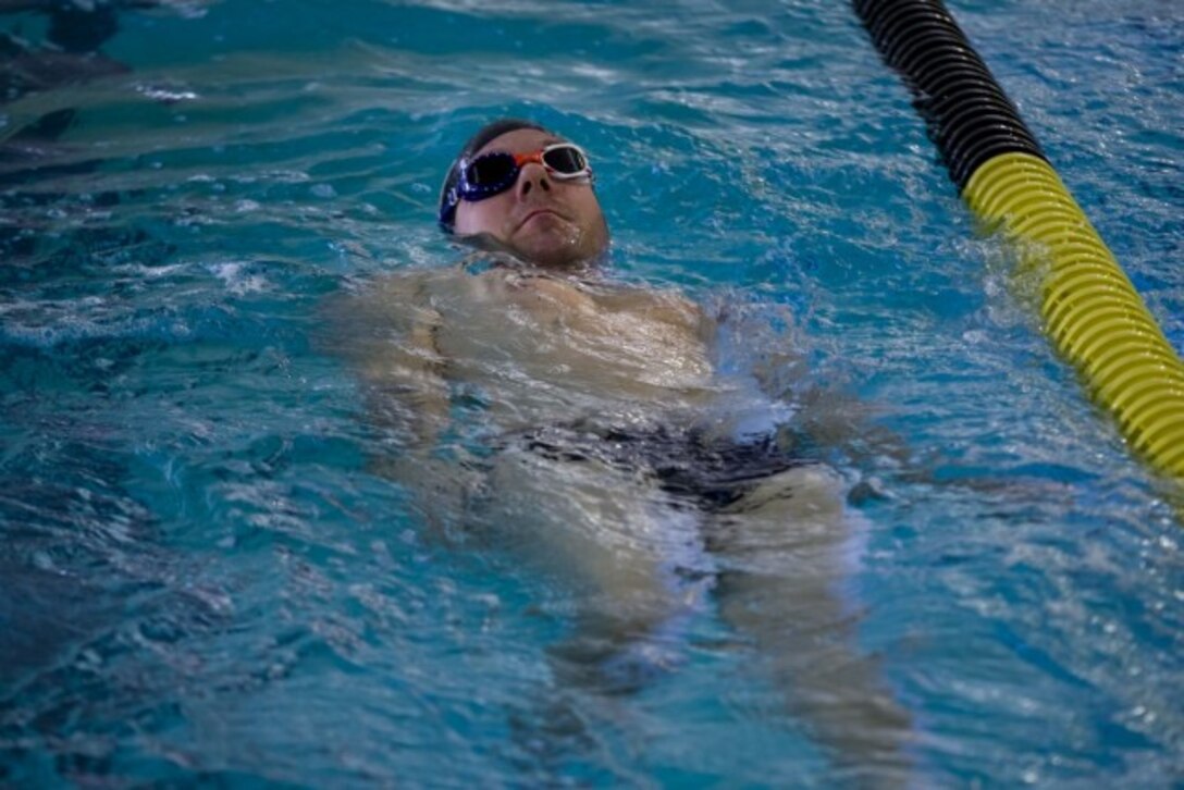 U.S. Army Staff Sgt. Justin Callison practices swimming on his back during swim practice at the 2025 Army Trials, Fort Bliss, Texas, April 3, 2025.
