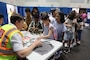 Daniel Carlson, Fire Protection Engineer, U.S. Army Corps of Engineers – Far East District, demonstrates the concept of water surface tension to students at a Science, Technology, Engineering, Arts and Mathematics (STEAM) event hosted by USACE at West Elementary School on Camp Humphreys, South Korea, on May 22, 2025. Through interactive experiments, Carlson inspires curiosity and a deeper understanding of scientific principles. (U.S. Army photo by Yohan An)