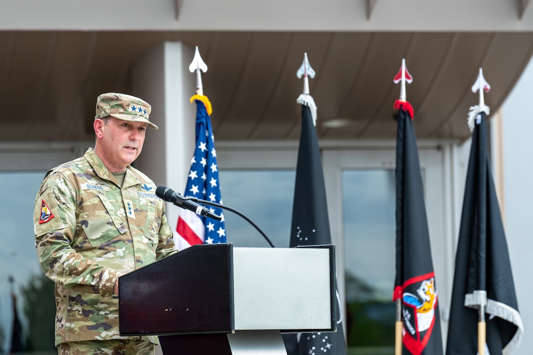 man in uniform speaking at podium