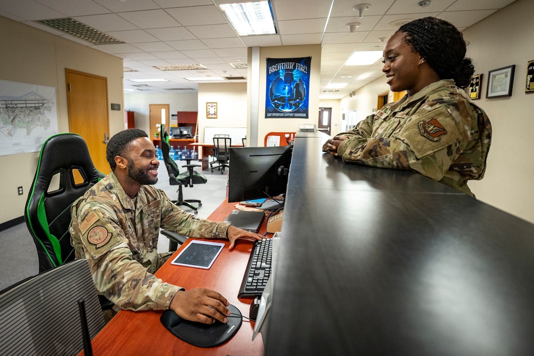 U.S. Air Force Senior Airman Calvin Wright, airfield management operations supervisor, 51st Operational Support Squadron, speaks with a teammate while coordinating scheduled runway checks for foreign object debris at Osan Air Base, Republic of Korea, June 3, 2025