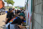 On June 3, alongside professional Korean artists, volunteers collaborated with the children to bring pre-designed murals to life at Yongsan Park. This special event not only marked the 103rd ROK Children’s Day, but also reinforced the enduring bond between our two communities through shared creativity and service. (U.S. Army photo by Pfc. Seong Ho Park, USFK Public Affairs)