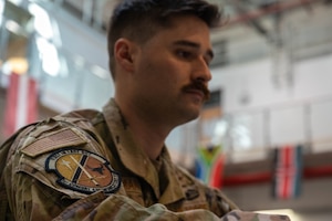 Warrant officer poses for photo.
