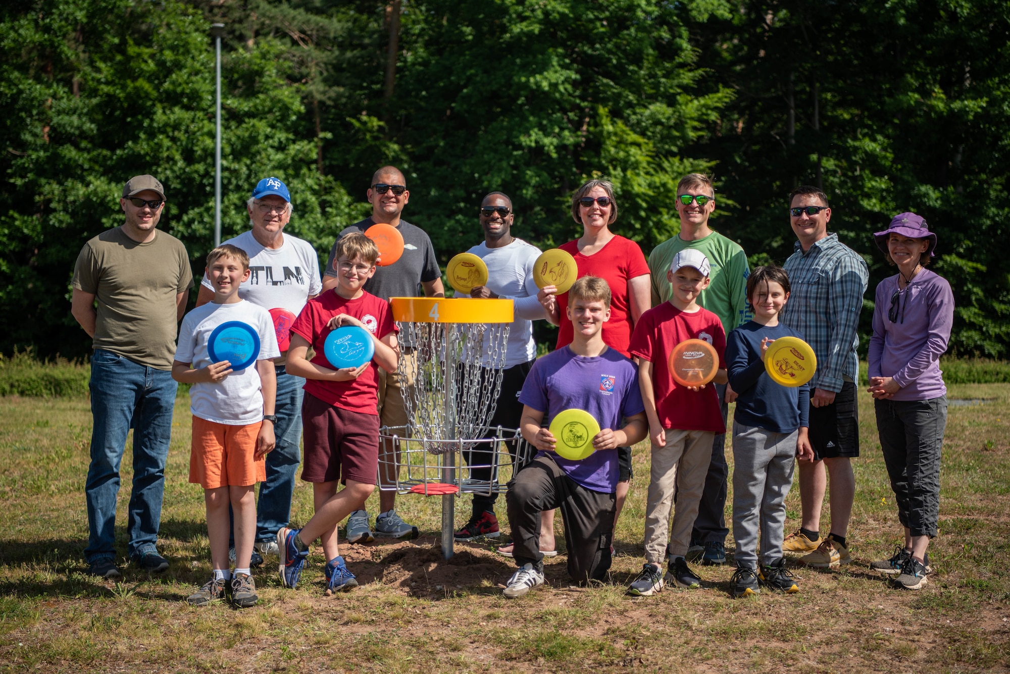 Boy Scouts of America members and sponsors of the Wayne Carlson Disc Golf Course pose for a group photo.