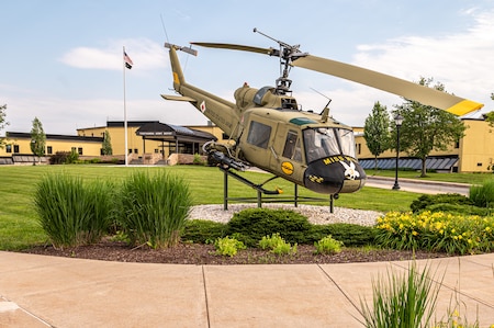 Photo of an Apache helicopter outside of the Admin Bldg