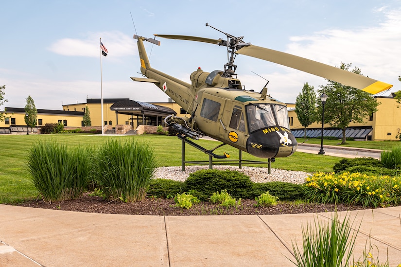 Photo of an Apache helicopter outside of the Admin Bldg