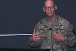 U.S. Army Brig. Gen. (Dr.) Lance Raney, Commanding General of Medical Readiness Command, East, serves as guest speaker during a recent luncheon saluting military caregivers at the USO on Naval Support Activity Bethesda, home to Walter Reed National Military Medical Center.