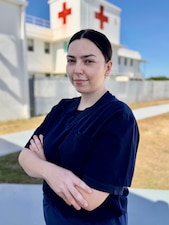 Hospital Corpsman 2nd Class Sierra Koch, a native of Apache Junction, Arizona, serves aboard U.S. Navy Medicine Readiness and Training Command (USNMRTC) Guantanamo Bay at U.S. Naval Hospital Guantanamo Bay, Cuba, May 19, 2025. Koch is a surgical technician and has served the Navy for seven years. (U.S. Navy photo by Emily McCamy/released)