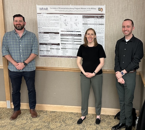 Dr. Bradley Fawver (WRAIR-West), Dr. Megan Douglas (WRAIR-West), and Philip Mastrosimone (WRAIR-West) present their poster on Kinesiophobia among Pregnant Women in the Military at Madigan Army Medical Center Research Day.