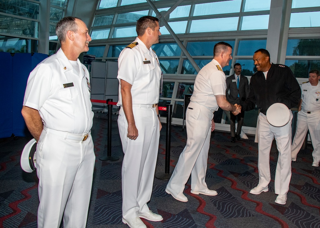 Admiral Alvin Holsey greets U.S. Naval leadership