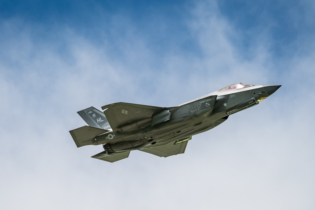 A close-up of an F-34 in flight