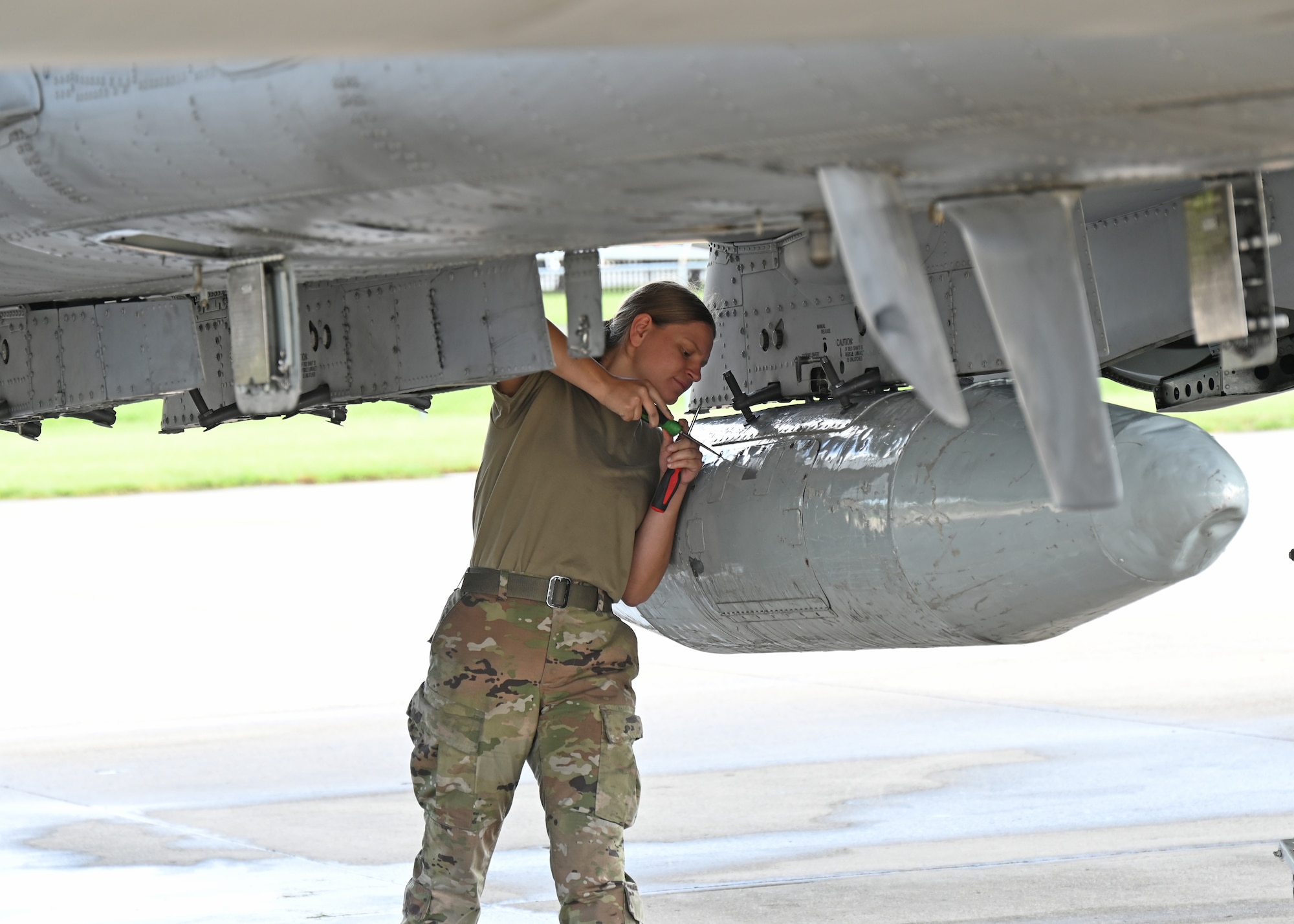 Maryland Air National Guard Staff Sgt. Samantha Condor, crew chief assigned to the 175th Aircraft Maintenance Squadron, Maryland Air National Guard, performs preflight duties on an A-10C Thunderbolt II aircraft at Warfield Air National Guard Base at Martin State Airport, Maryland, May 30, 2025, before a flight to Selfridge Air National Guard Base.