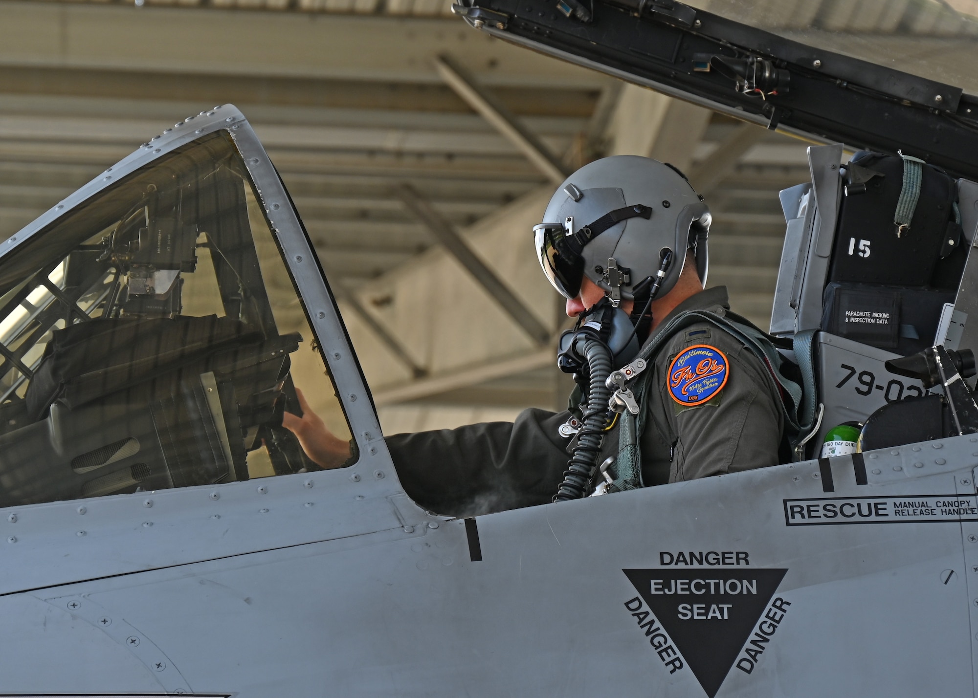 Maryland Air National Guard 1st Lt. Bay Mcintosh, an A-10 pilot assigned to the 104th Fighter Squadron, Maryland Air National Guard, performs preflight duties on an A-10C Thunderbolt II aircraft at Warfield Air National Guard Base at Martin State Airport, Maryland, May 30, 2025, before being transferred to Selfridge Air National Guard Base.