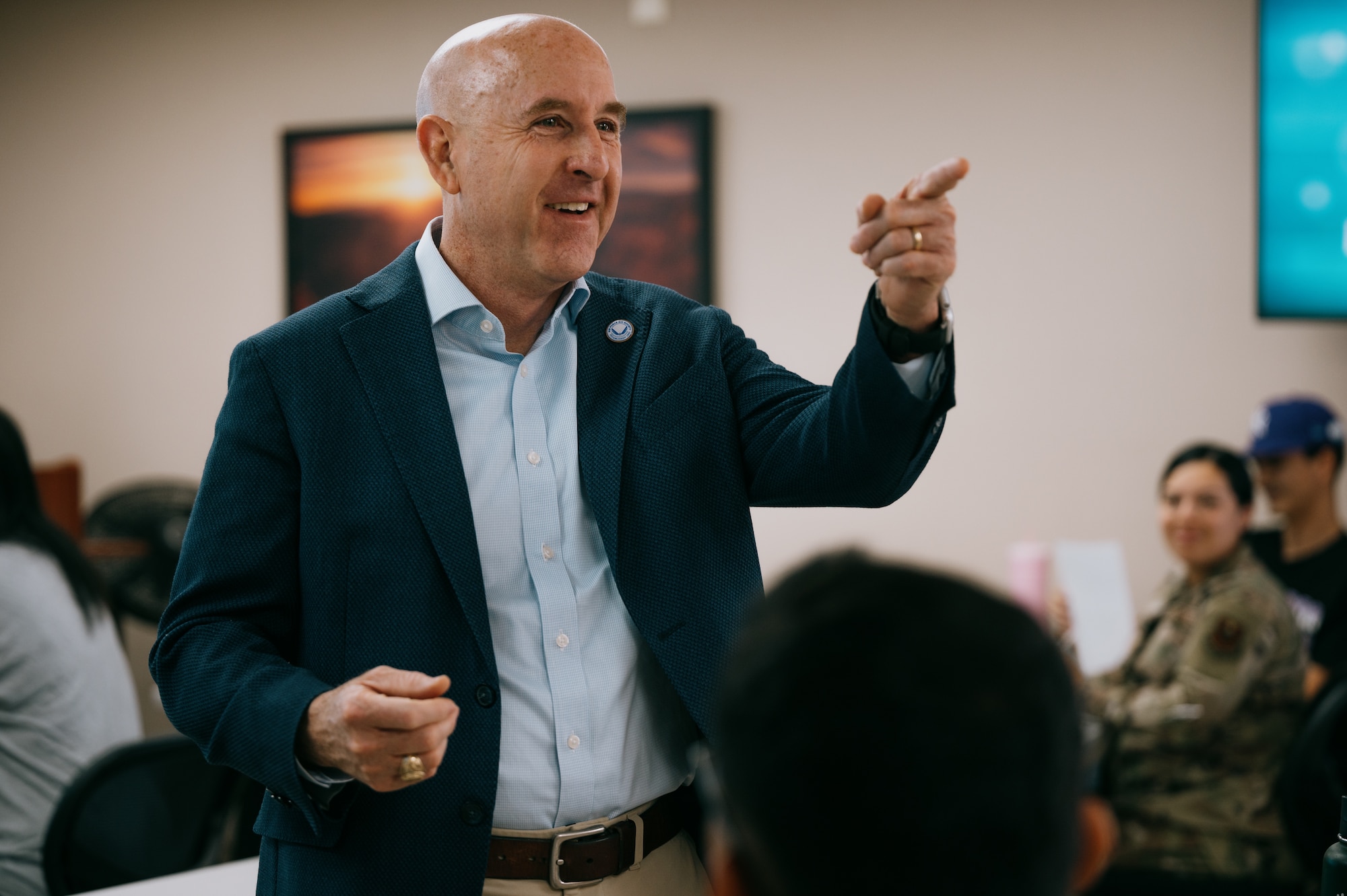 U.S. Air Force Retired Ma. Gen. Edward Thomas Jr., Air Force Aid Society chief executive officer, speaks to first time parents in the Military and Family Readiness Center.