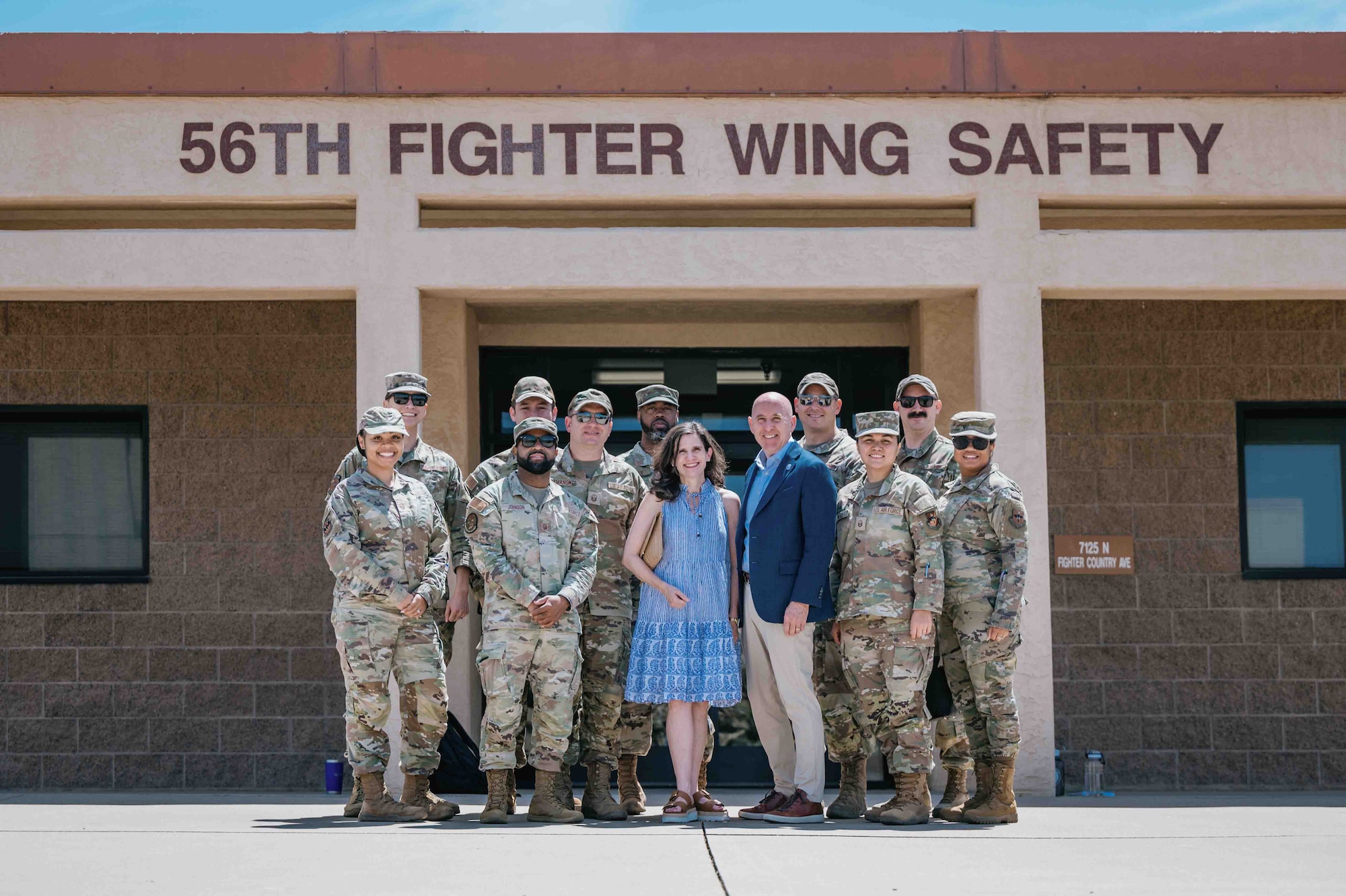U.S. Air Force Retired Maj. Gen. Edward Thomas Jr., Air Force Aid Society chief executive officer and his wife, pose for a photo with 56th Fighter Wing First Sergeants.