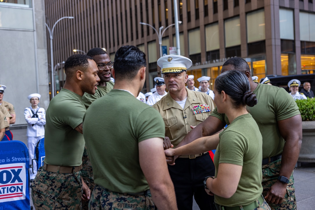 U.S. Marine Corps Brig. Gen. Thomas M. Armas, deputy commander, Fleet Marine Force, Atlantic, Marine Forces Command, Marine Forces Northern Command, gives a pep talk to Marines with Special Purpose Marine Air-Ground Task Force - Fleet Week New York prior to a tug of war event during a live Fox and Friends Memorial Day broadcast as part of Fleet Week New York, May 26, 2025. America’s warfighting Navy and Marine Corps celebrate 250 years of protecting American prosperity and freedom. Fleet Week New York 2025 honors the Navy, Marine Corps, and Coast Guard’s enduring role on, under, and above the seas. (U.S. Marine Corps photo by Cpl. Christian Salazar)
