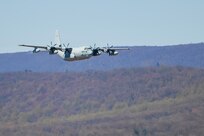 A KC-130J Super Hercules from Marine Corps Air Station Cherry Point, North Carolina, drops flares to counter surface to air missiles in a training exercise at Bollen Air-to-Ground Range located at Fort Indiantown Gap, Annville, Pennsylvania, April 17, 2025. Bollen Range is operated by the 193rd Special Operations Wing and supports training activities for a variety of aircraft from U.S. Air Force units as well as additional military helicopter, heavy transport and special mission aircraft conducting training in the northeastern United States. (U.S. Air National Guard photo by Airman Austin Stern)