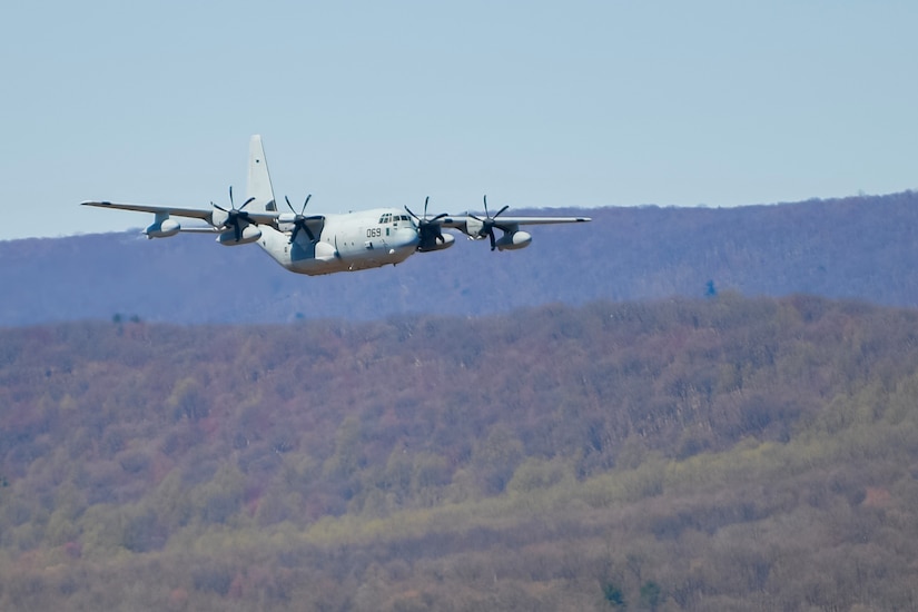 A KC-130J Super Hercules from Marine Corps Air Station Cherry Point, North Carolina, drops flares to counter surface to air missiles in a training exercise at Bollen Air-to-Ground Range located at Fort Indiantown Gap, Annville, Pennsylvania, April 17, 2025. Bollen Range is operated by the 193rd Special Operations Wing and supports training activities for a variety of aircraft from U.S. Air Force units as well as additional military helicopter, heavy transport and special mission aircraft conducting training in the northeastern United States. (U.S. Air National Guard photo by Airman Austin Stern)