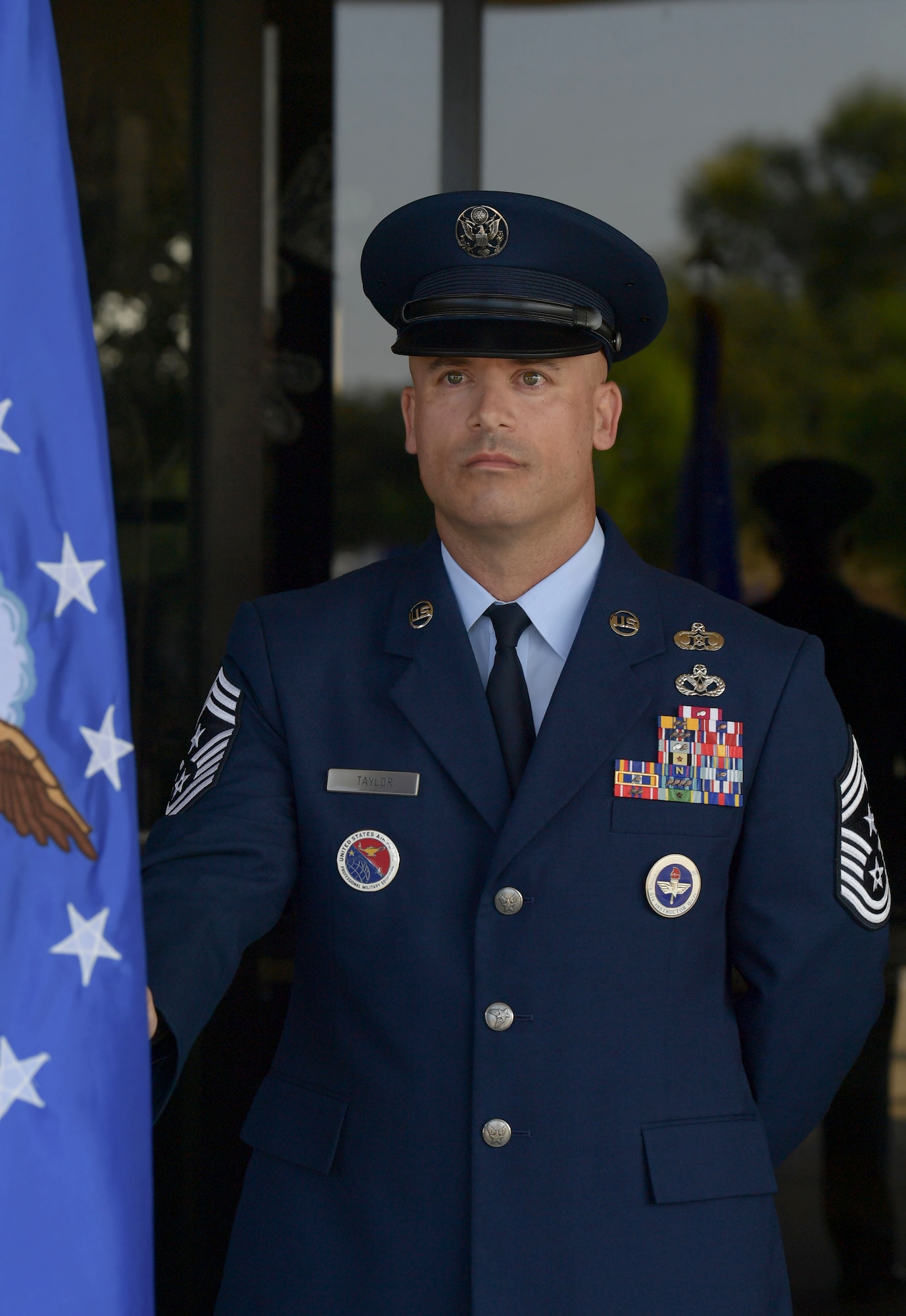 An airman holding the guidon.