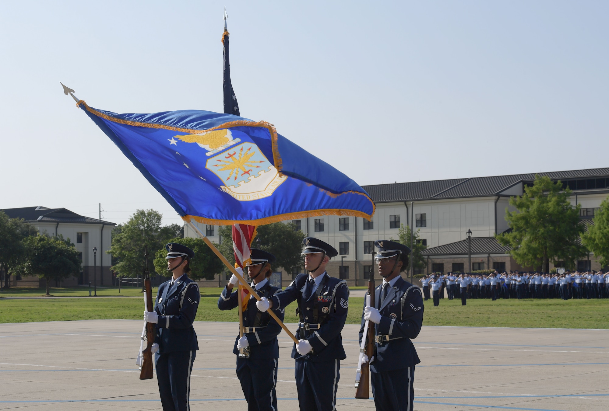 The honor guard marching.